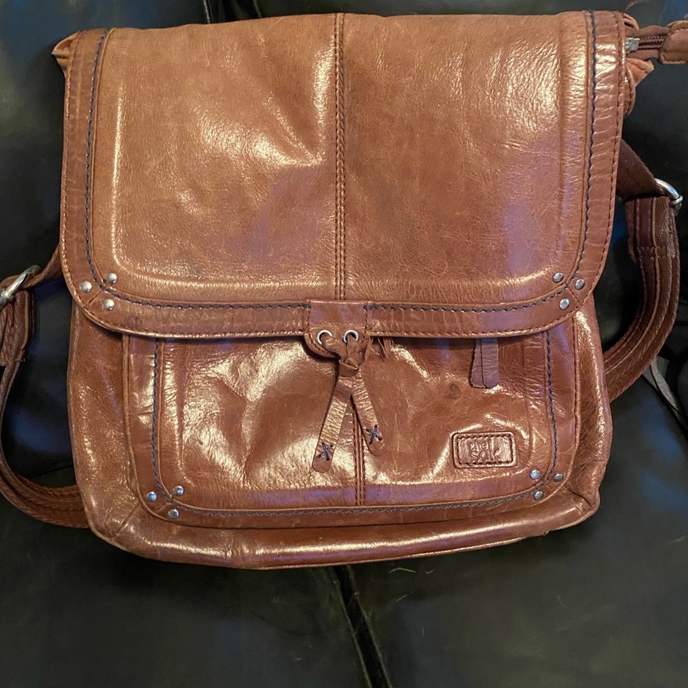 The Sak brown leather convertible backpack